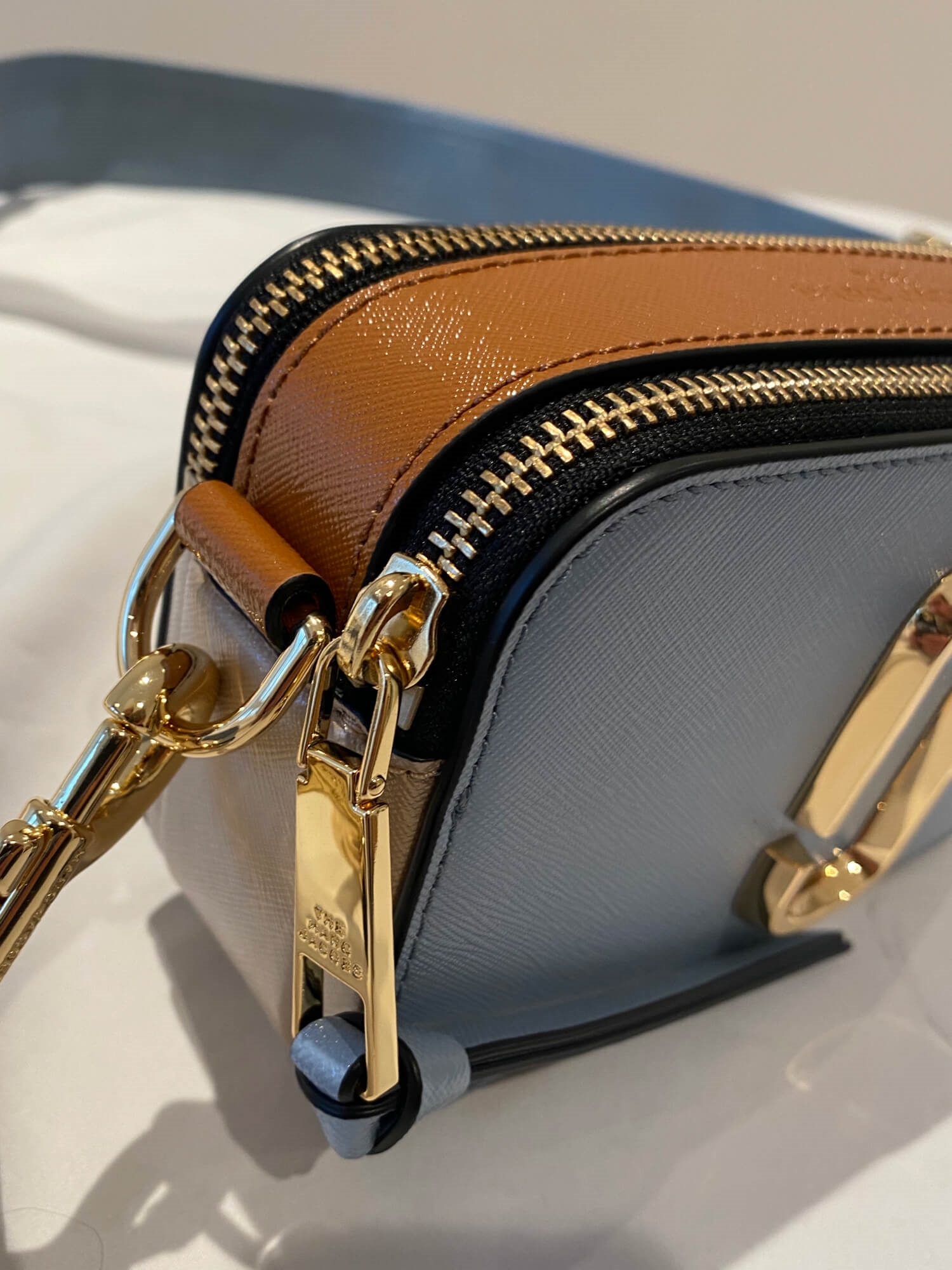 marc jacobs snapshot skyline blue Cinosural International School
